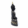 Buddha meditiert in Schwarz und Gold